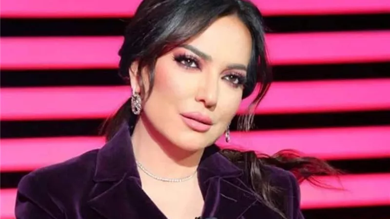 أمل عرفة في 